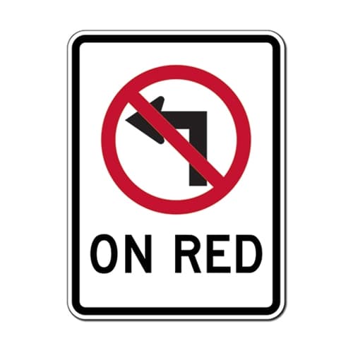 No Left Turn On Red sign - Left turns on red are prohibited, even from a one-way to a one-way street.