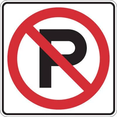 No Parking sign - Forbids parking within the area or times shown; stopping to load or unload may be limited.