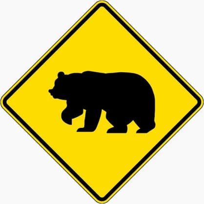 Bear Crossing sign - Warns that bears may cross the road in this area, especially in rural or forested regions.