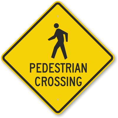 Pedestrian Crossing sign - Indicates a marked crosswalk or area where pedestrians frequently cross; yield to people in the crosswalk.
