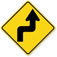 Right Reverse Turn sign - Shows a sharp turn followed by a reverse turn, starting to the right.