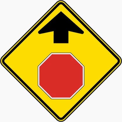Stop Ahead sign - Warns that a stop sign is coming up where it may not be visible in time to react; begin slowing down.
