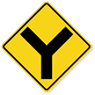Y Intersection sign - Warns that the road ahead splits into two branches forming a Y-shaped intersection.